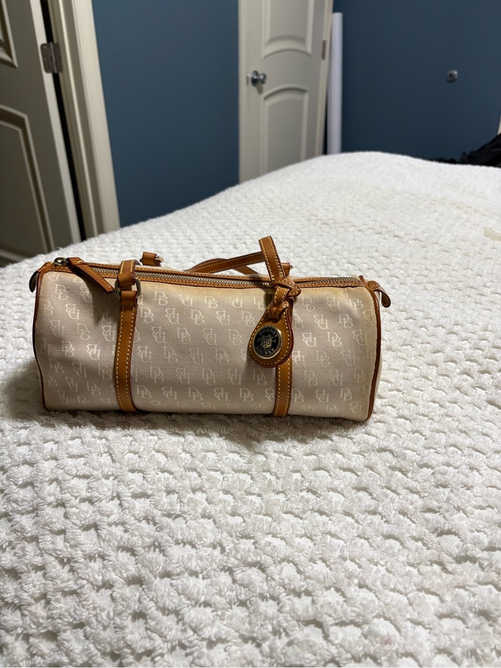 Dooney & Bourke Cream Monogram Barrel Bag with Tan Trim